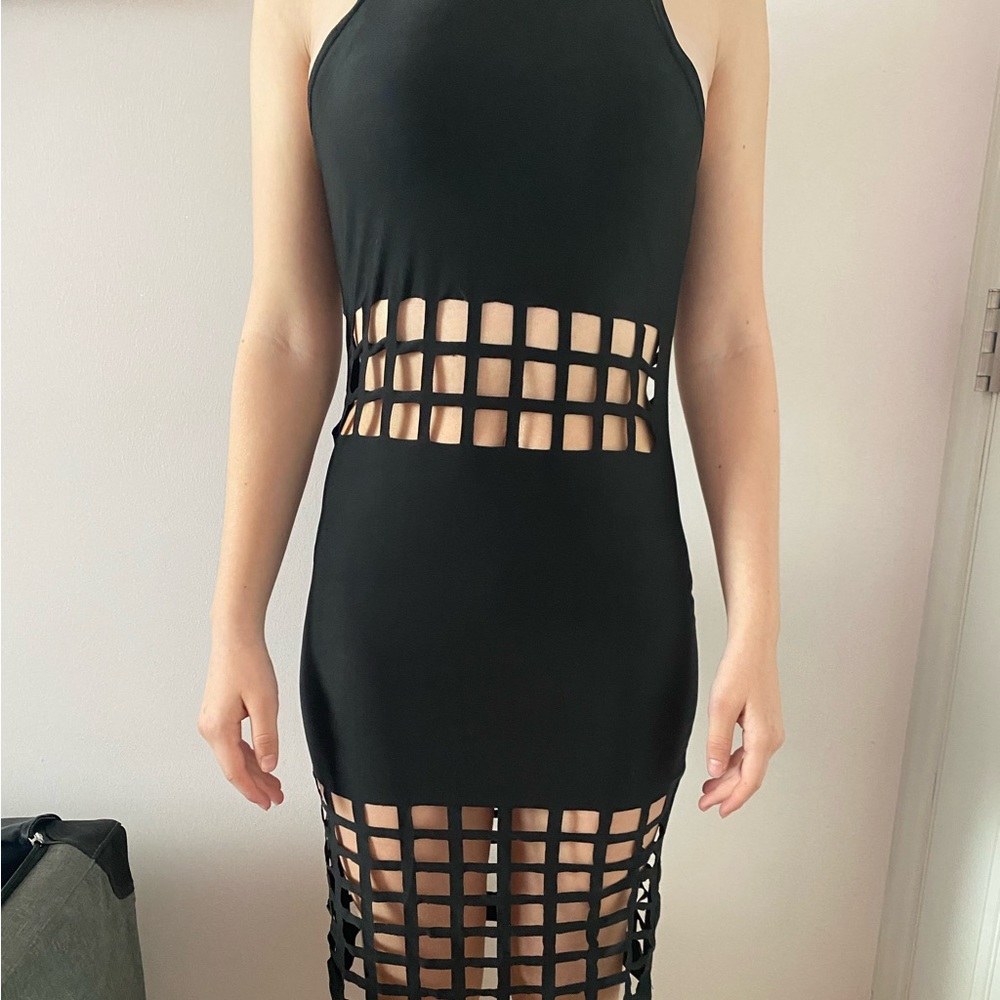 A black Pencil turtle neck dress.